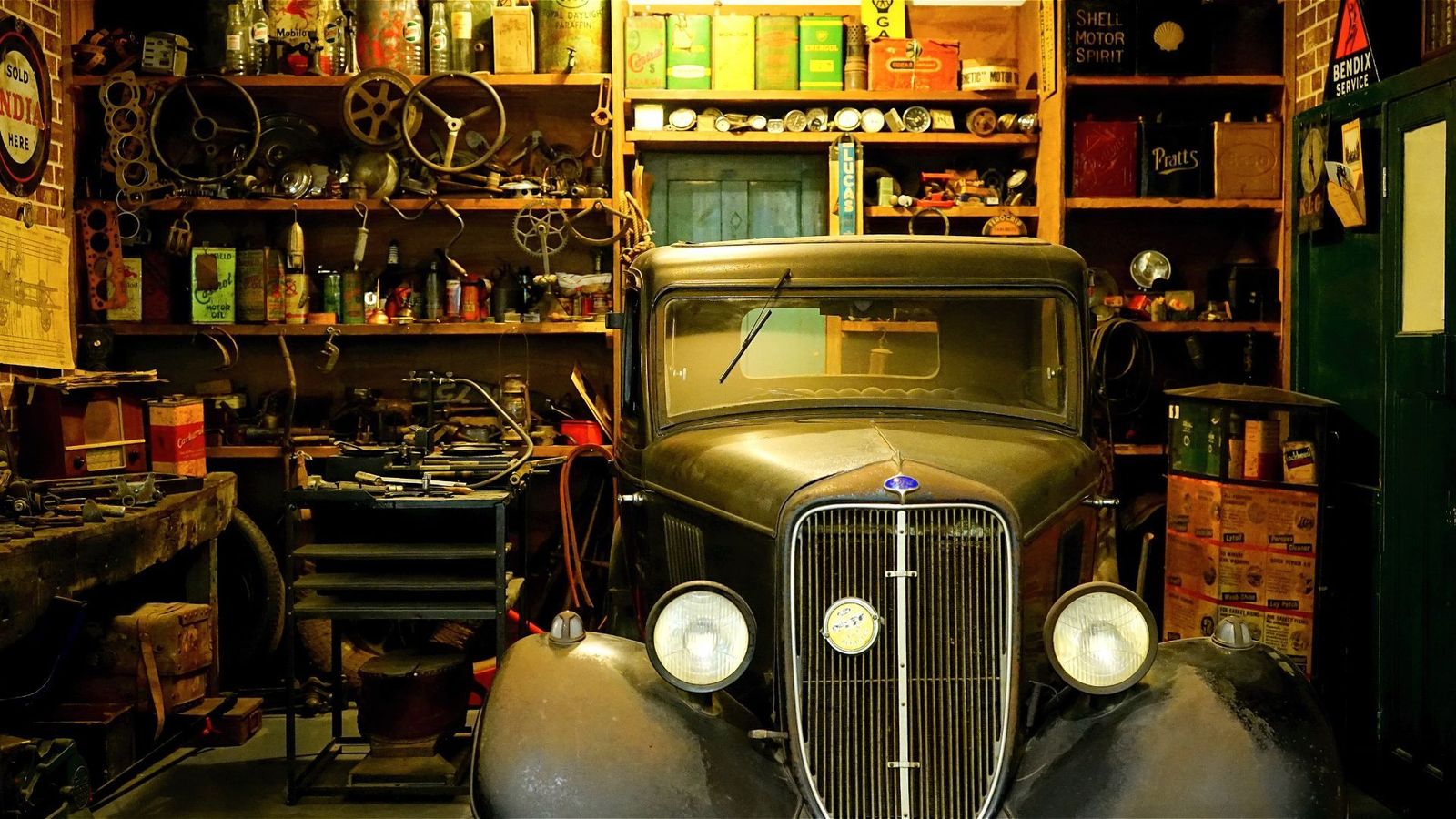 Vintage truck stored in a well-stocked garage